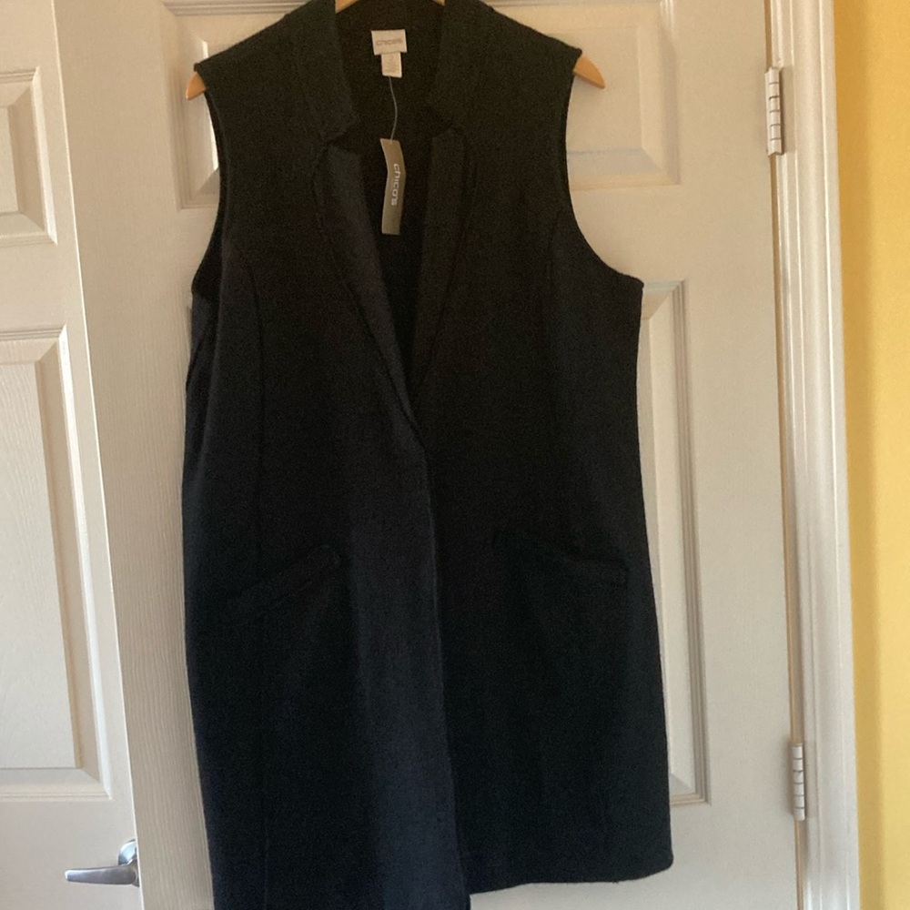 Brand new 100% wool vest. Super cute never wore with tags.